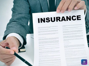 Business professionals reviewing private loan investment documents at an insurance company office.