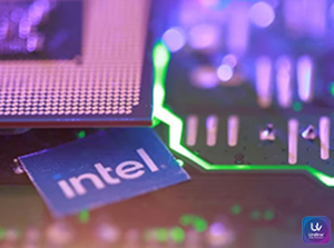 Intel logo displayed on a stock market screen as shares rise after a positive AI-driven business forecast.
